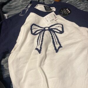 Blue and white bow sweater